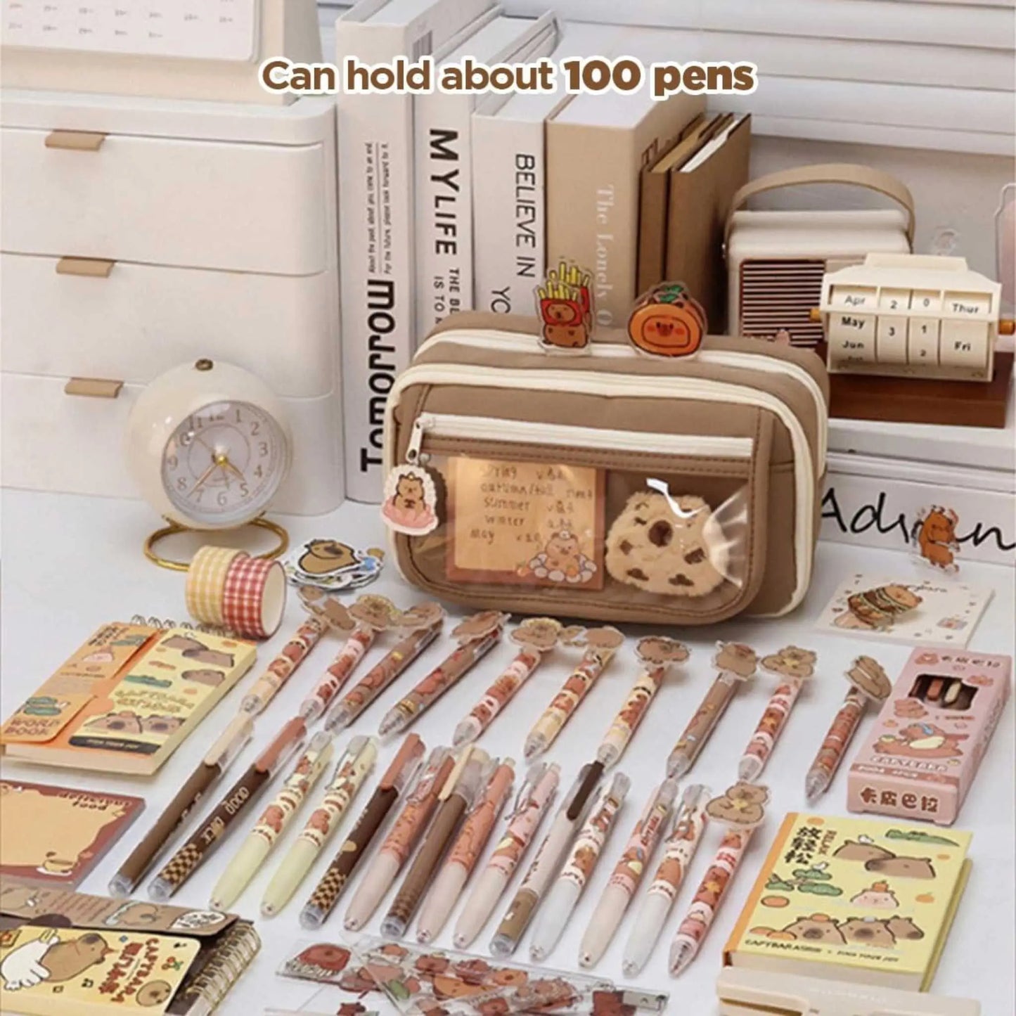 A multi compartment pencil box filled with numerous pens and stationery, demonstrating its large capacity. The ultimate pencil bag.