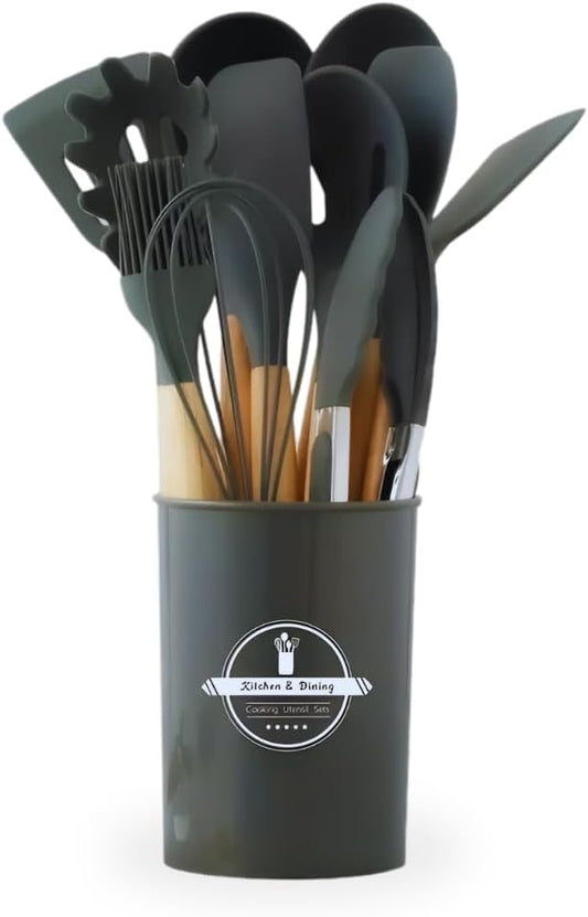 Set of kitchen utensils in a dark gray container on a white background