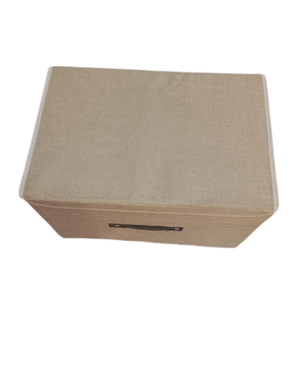 Beige fabric box with a handle on a white background