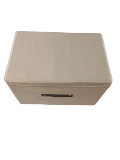 Beige storage box with a handle on a white background