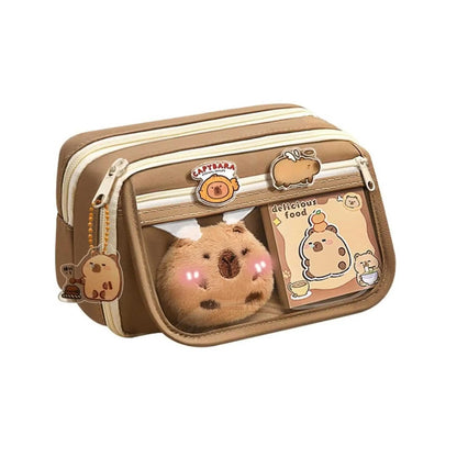 Cute brown pencil case with multi-layer compartments, large capacity, featuring a Capybara charm. Ideal pencil pouch for students.