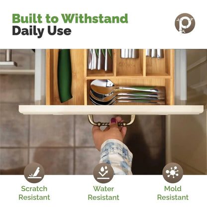 Hand reveals scratch & water-resistant bamboo kitchen drawer organiser. Essential for any cutlery tray and drawer organizer needs.