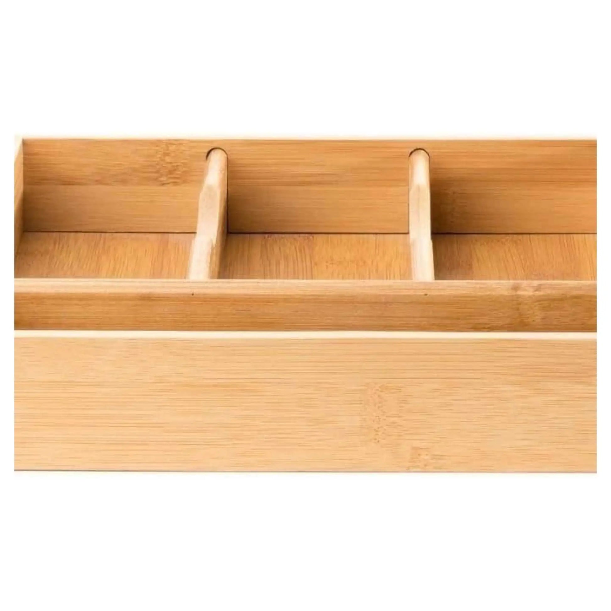 Close-up of bamboo cutlery organizer's dividers, highlighting its design for kitchen drawer organisation.