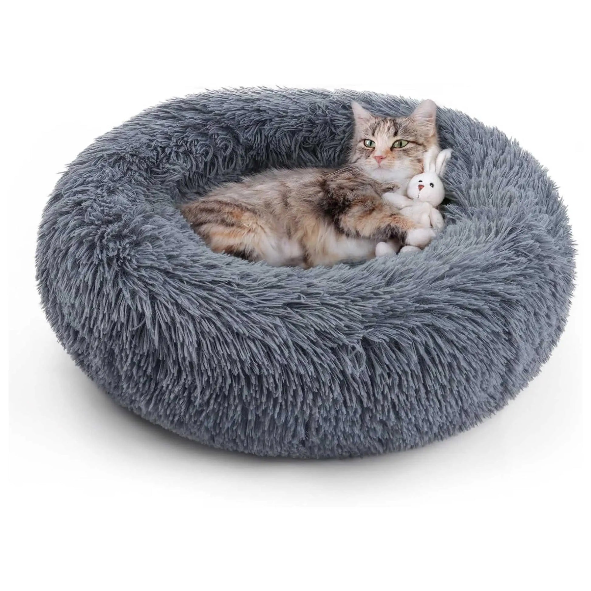 Cozy donut cat bed for a tabby cat. This plush donut shaped cat bed offers ultimate comfort for nesting.