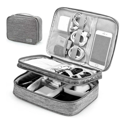 Open grey cable organizer bag showing double-layer compartments for electronics, cables, and phone; a perfect travel case for electronics.