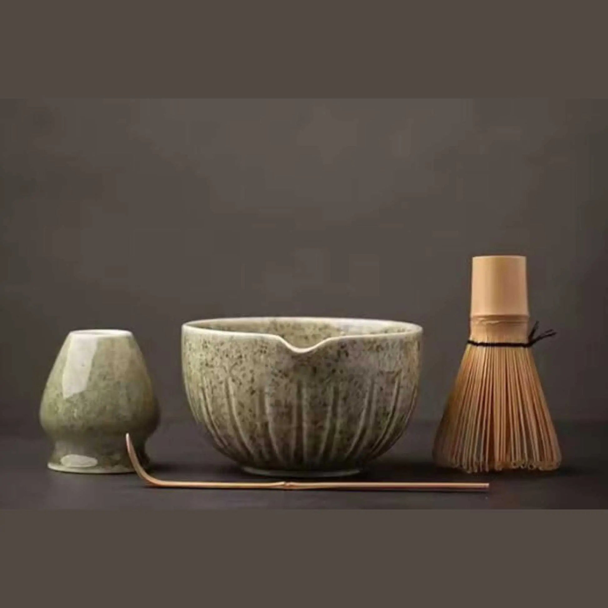 Authentic 4-piece Japanese matcha tea set: includes ceramic bowl, bamboo whisk, scoop, and whisk holder. Best matcha tea set.