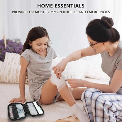 Woman using a bandage from the first aid kit set on a child. Essential home medical kit.