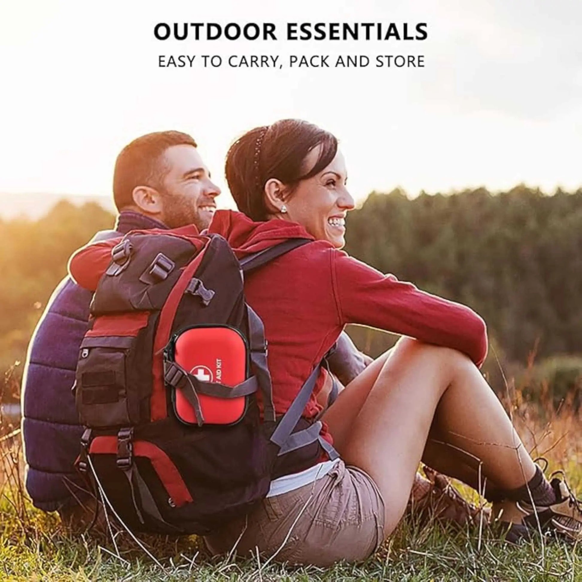 Red first aid kit attached to backpack for travel. Ideal camping first aid kit.