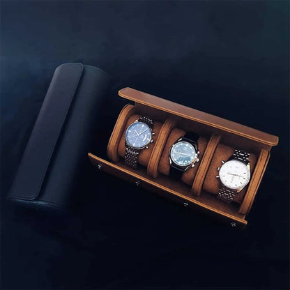 Open brown leather watch roll case holding 3 watches on velvet pillows, showcasing secure travel storage.