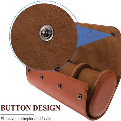 Close-up of the snap button closure on a premium brown leather watch roll case.