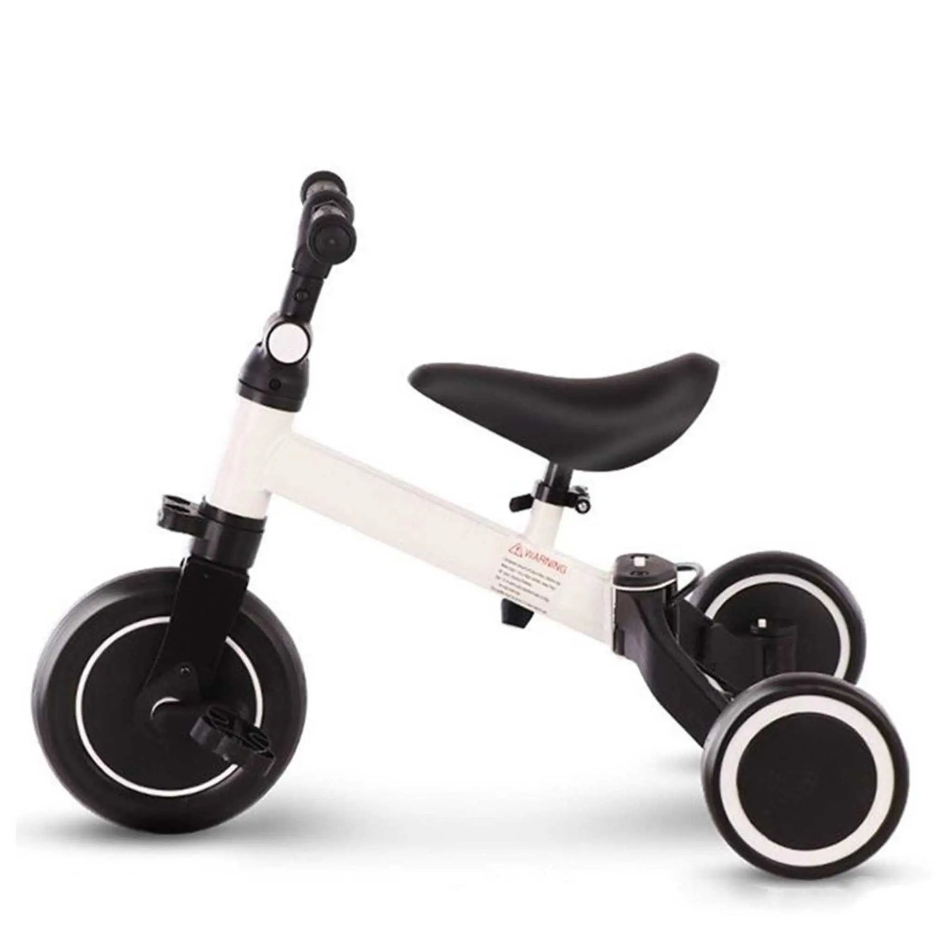 A white and black toddler tricycle with a large front wheel and two small rear wheels, designed as a balance bike.